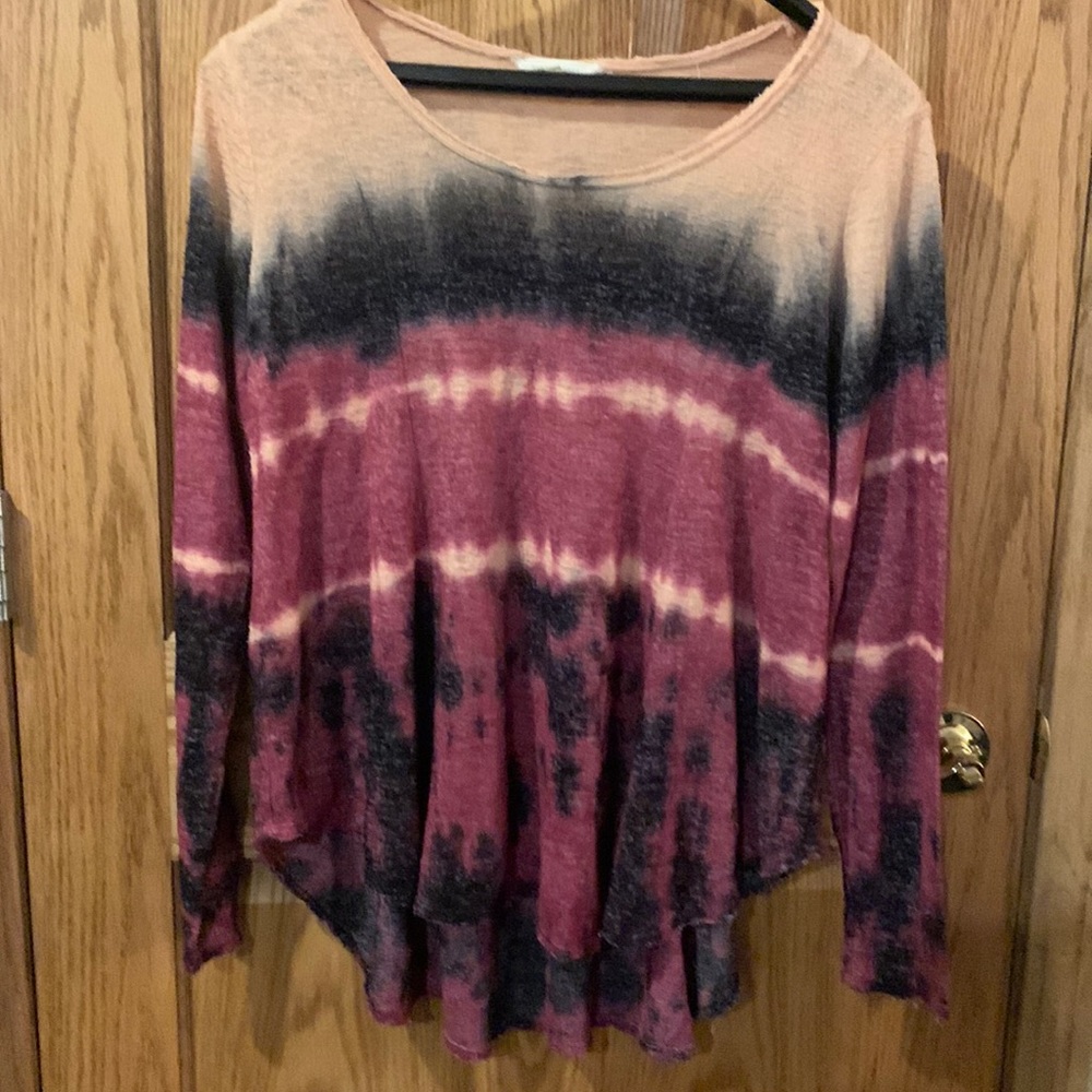 How colorful and fun is this sweater . Just throw it on and off you go!